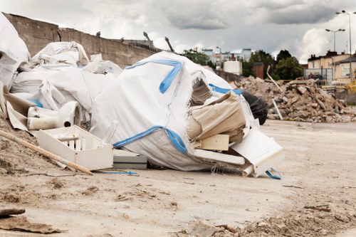 Professionals sorting business waste for recycling