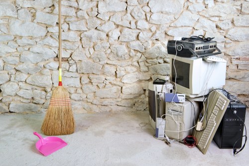 Professional loft clearance team at work in a Tufnell Park home