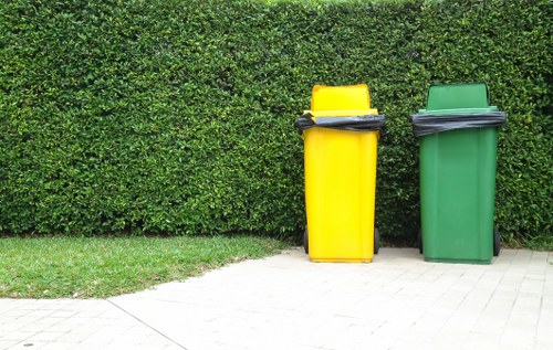 Professional waste clearance team handling construction materials